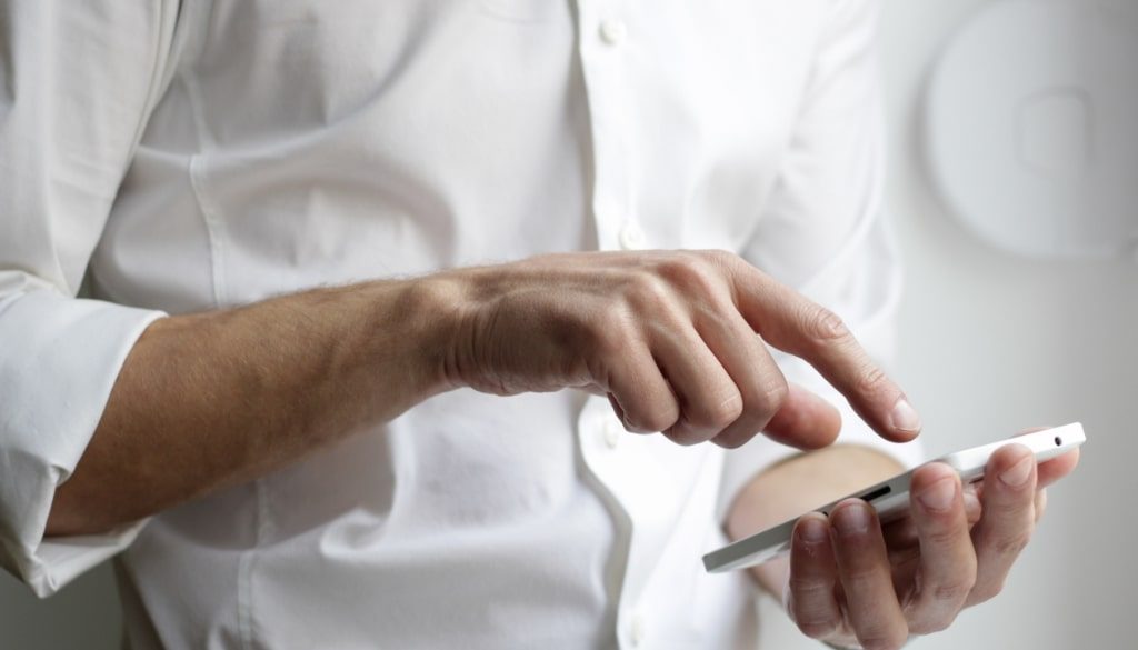 blog-man-with-phone-UN001 blog-man-with-phone-UN001